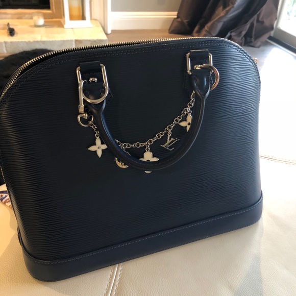 Louis Vuitton Handbags - Alma MM blue epi with receipt